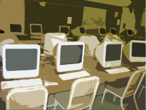computer lab with 1990's computers round a central table