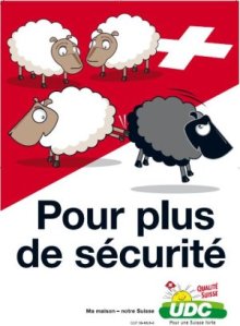 Click on the picture to enlarge it, if you have a strong stomach 3 white sheep on a Swiss flag, kicking out a black sheep, with the slogan "Pour plus de sécurité" and the logo of the UDC party