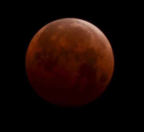 Blood red moon taken in Honolulu on 10/8/14 at 1:28am. Nikon D5100, f5.6, 1/3 sec., ISO 250, 300mm.