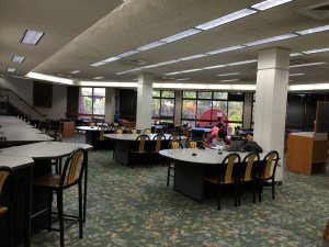 Students use their own notebooks on study tables. The entire library is a hot zone.