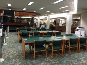 Study tables, with the circulation counter in the background.